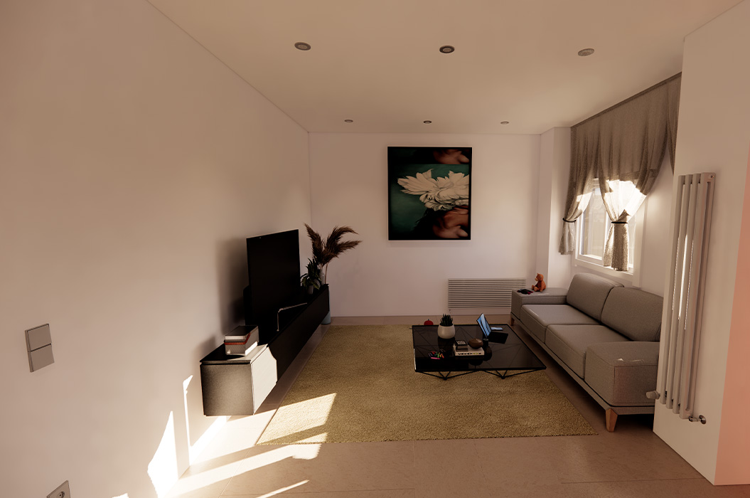 Helles Wohnzimmer ohne Personen mit grauem Sofa und Blumenbild an der Wand