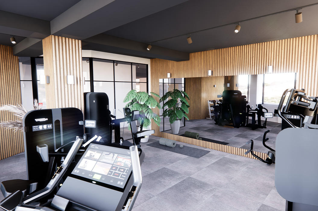 Leeres Fitnessstudio mit schwarzen Geräten, grauem Boden und Spiegelwand